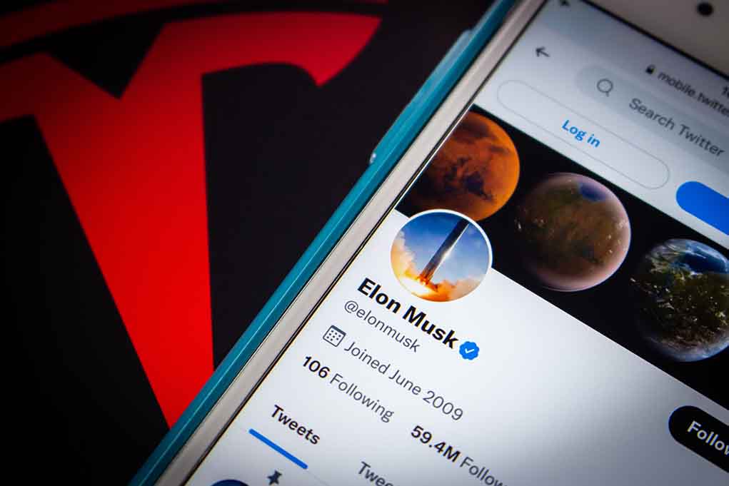 Twitter profile page on a smartphone screen.