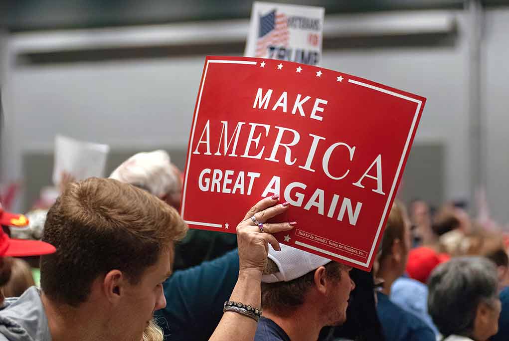 Person holding a sign.