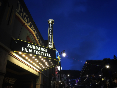 Egyptian Theatre marquee displaying Sundance Film Festival at night