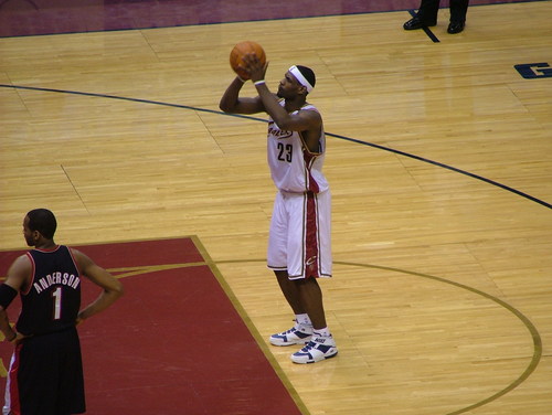 Basketball player 23 preparing to shoot free throw.